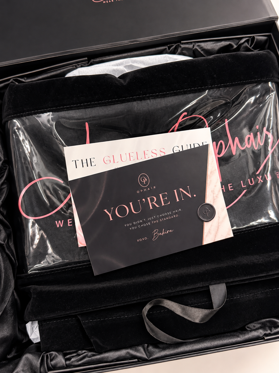 The OPHAIR box, ready to ship with a styled glueless wig inside