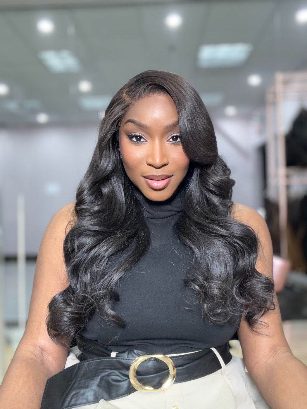 Front view of the OPHAIR Saraï human hair wig with a natural side-part hairline